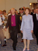 Archbishop Harper leads President McAleese into Synod.